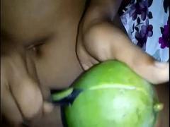 Download tube video category indian (915 sec). Bhabhi playing with herself using green mango.